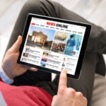 a man Reading Online News